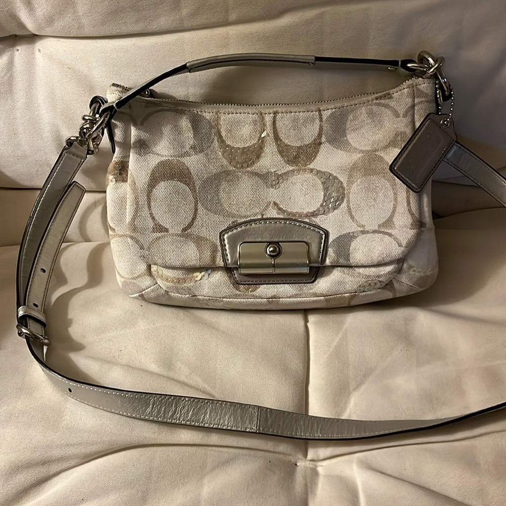 Coach cream colored